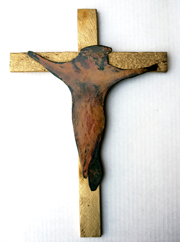Crucified Coyote, sculpture edition, c. 1981; hand colored photograph on board attached to gold painted wood by artist Paulette Nenner