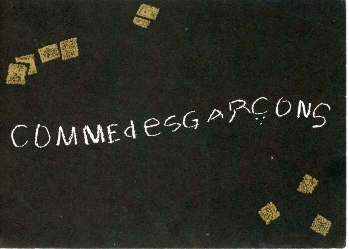 front of Dianne Benson Stores card for Comme des Garçons